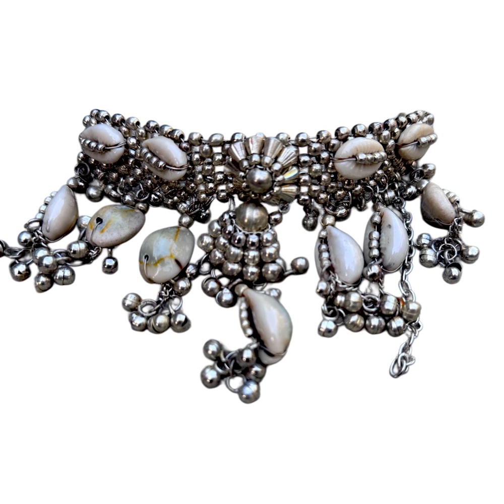 Elegant Silver and Cream Shell angle, bracelets, and matching bracelets.